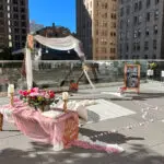 Romantic outdoor picnic setup in San Francisco with city skyline