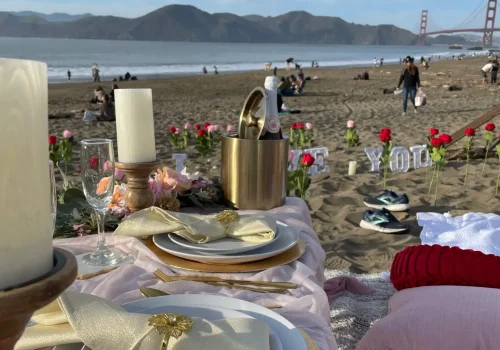 Elegant outdoor picnic setup facing Golden Gate Bridge with ocean views